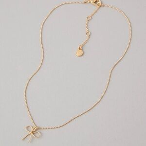 American Eagle Bow necklace, never worn, no tags details on last slide.